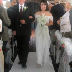 07b-2011-Lorraine-De-Rose-marries-Del-gives-bride-PG-11